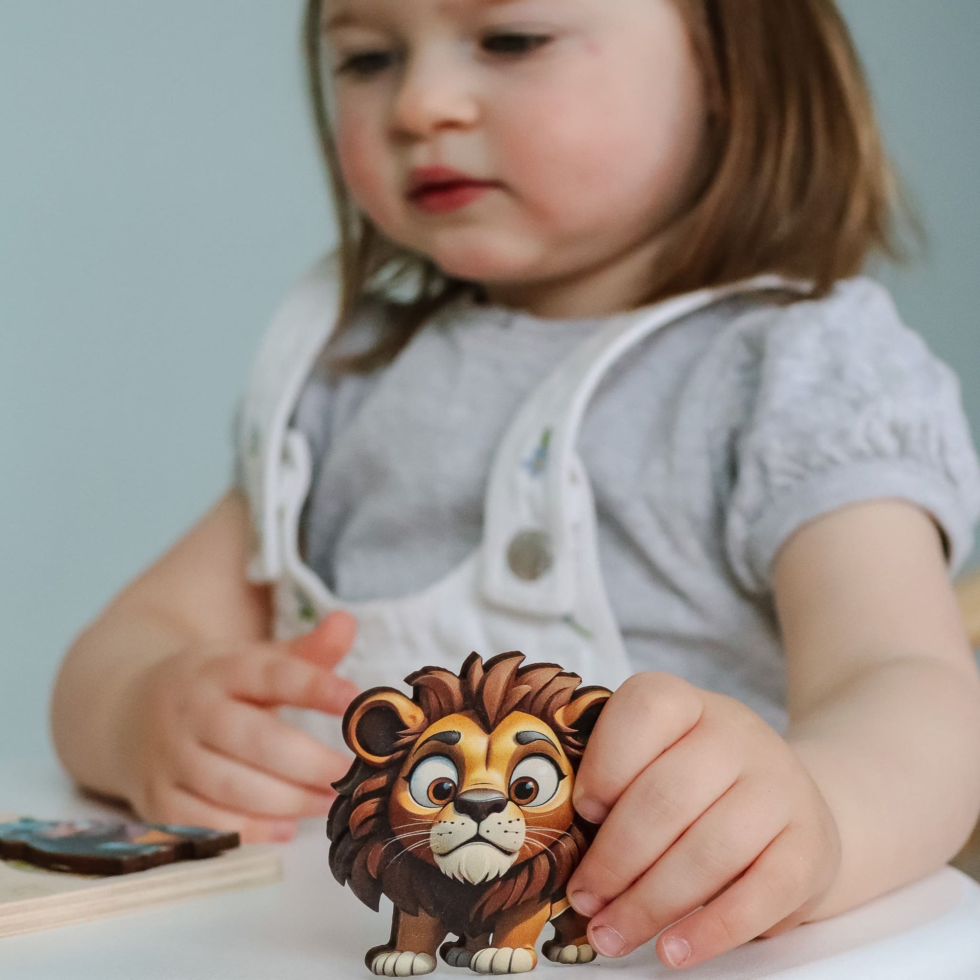 Custom wooden name puzzle with magnetic safari animals