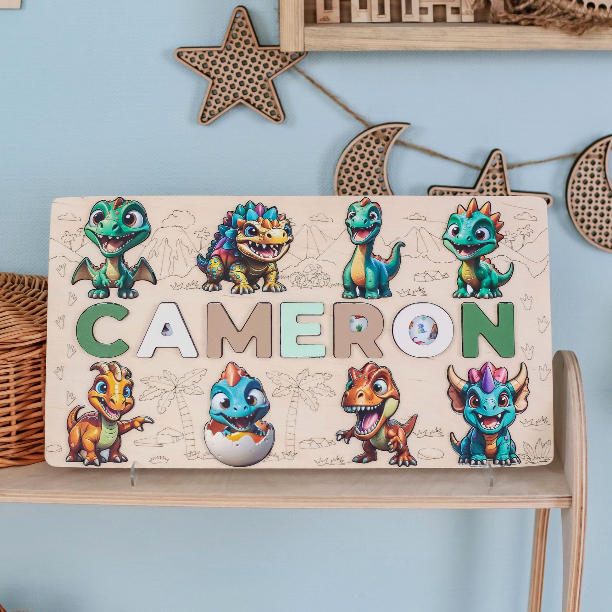 Kids alphabet puzzle with magnetic dinosaur figures