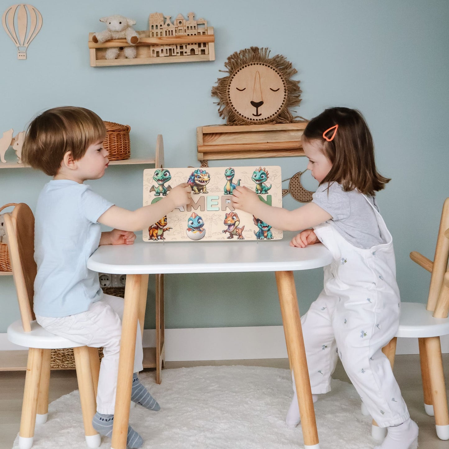 Child’s name puzzle with prehistoric theme
