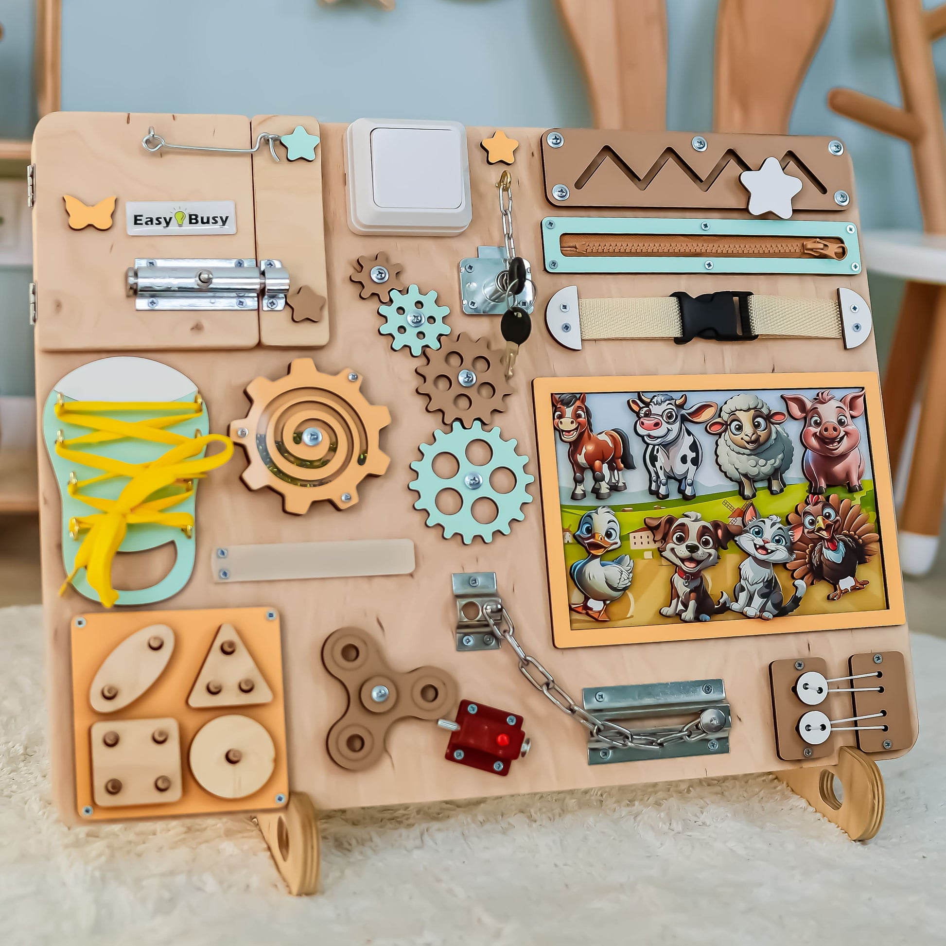 Fine motor skill development toy with removable farm animals