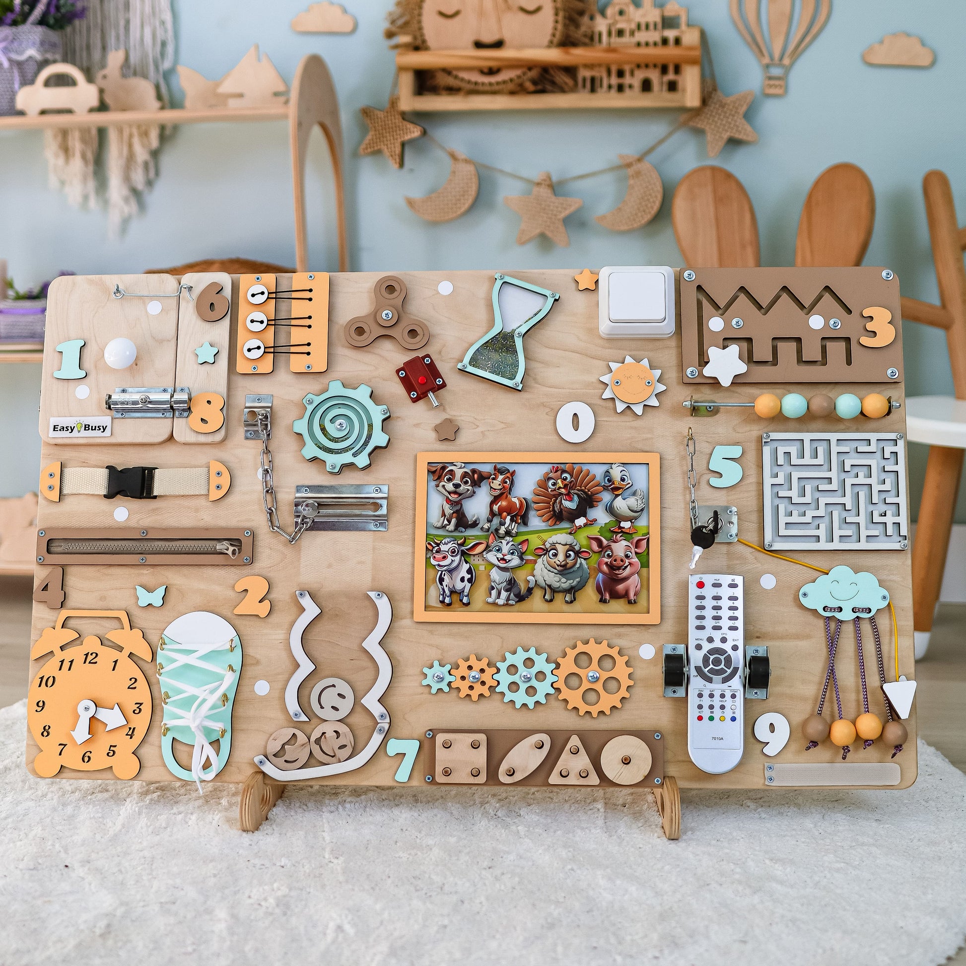 Montessori fine motor skill toy with a detailed countryside scene