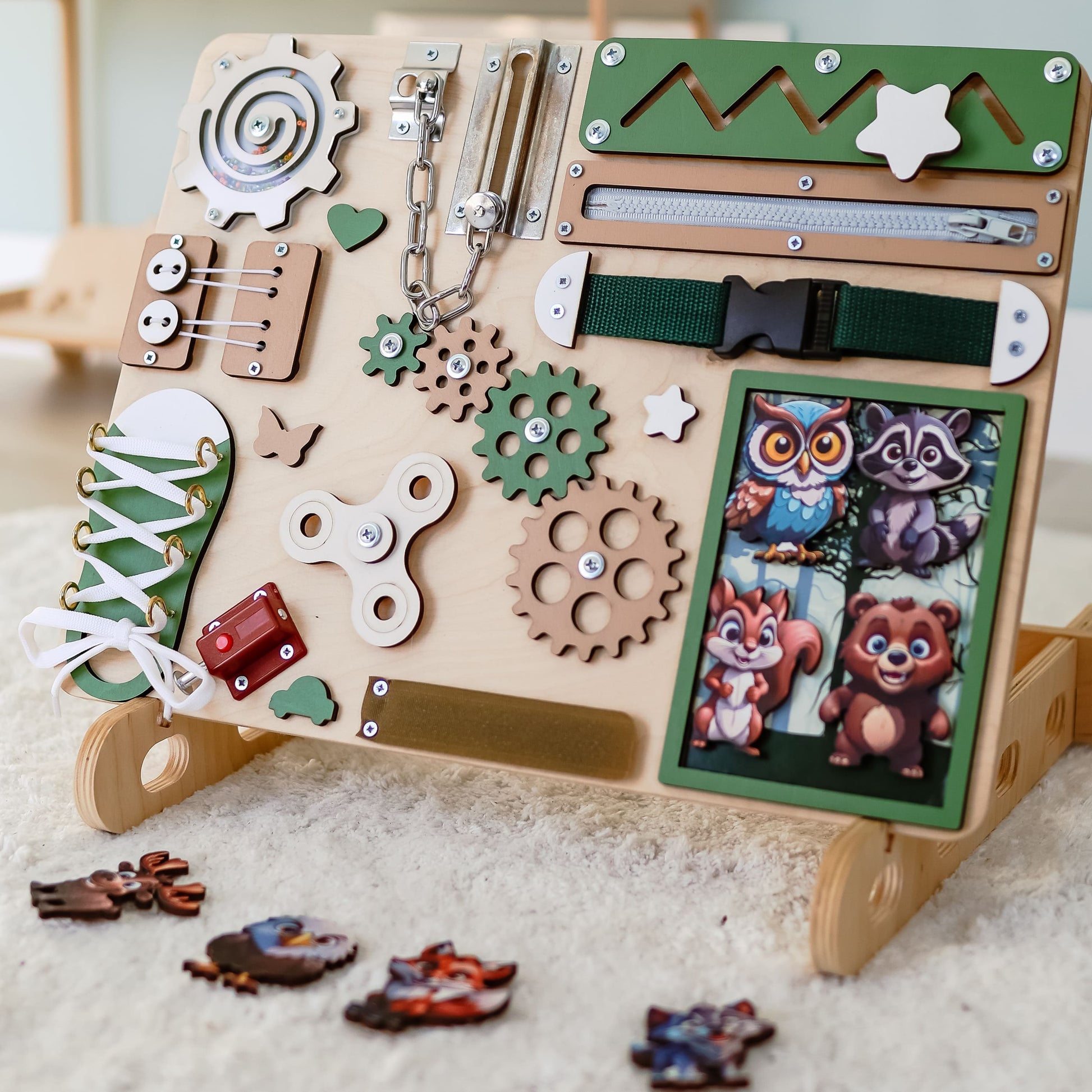 Woodland-themed animated busy board with magnetic forest animals