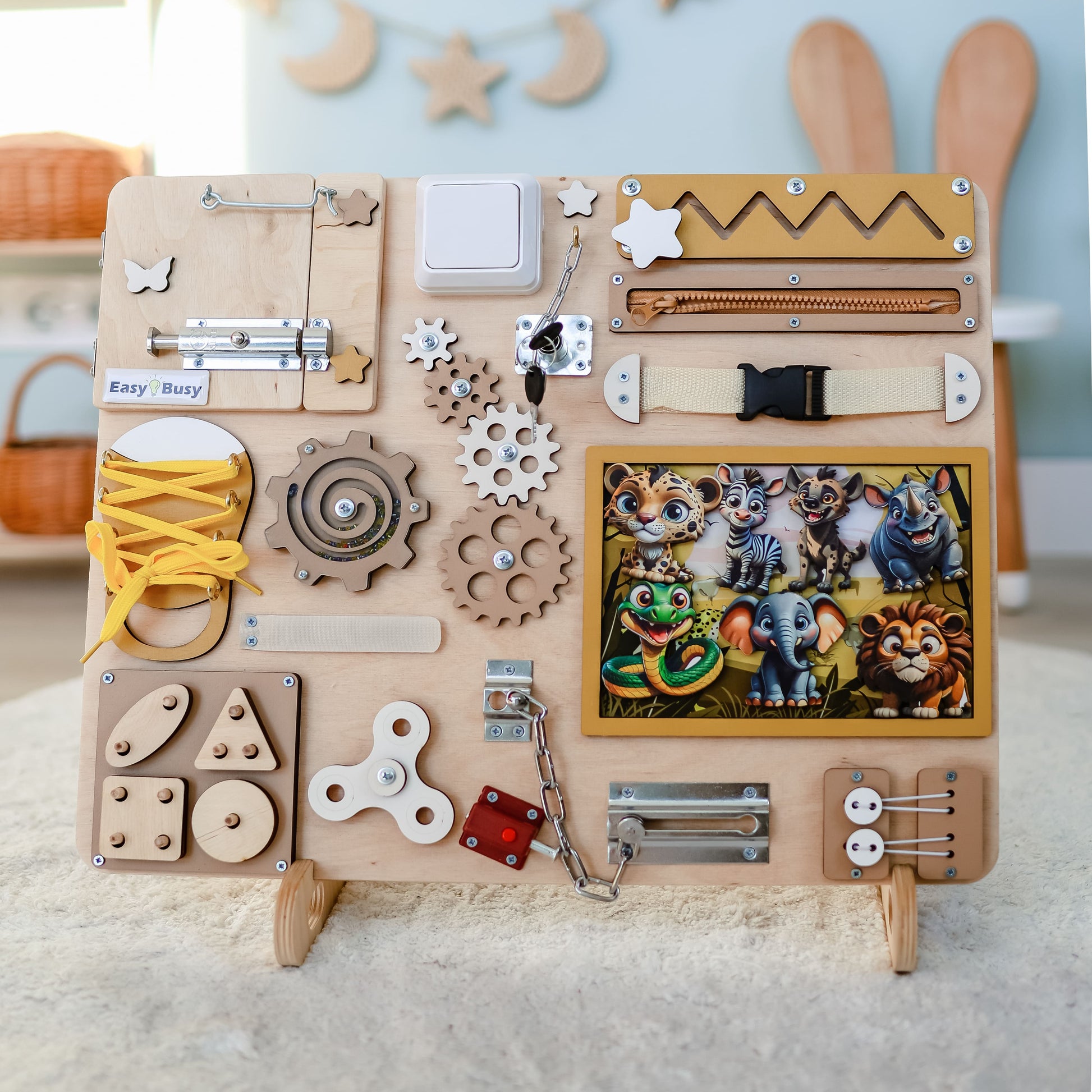 Handmade safari-themed busy board with removable magnetic animals