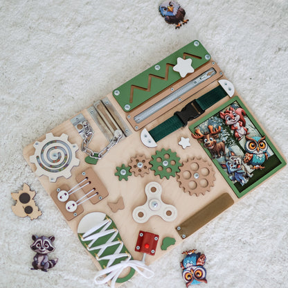 Handcrafted busy board with a vibrant woodland animal theme