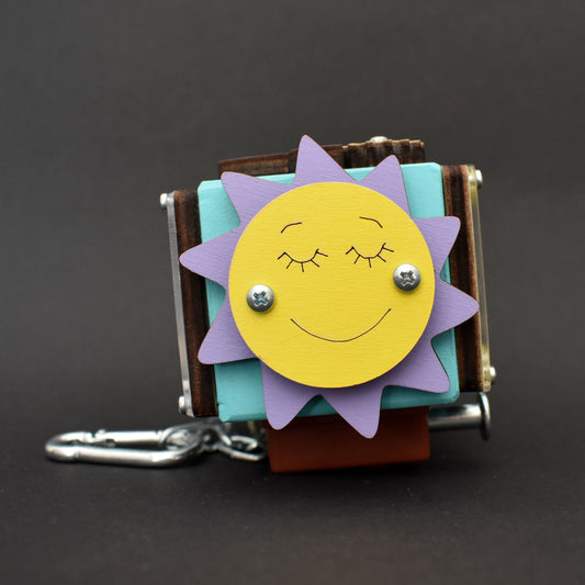 Montessori busy cube side with rotating gears