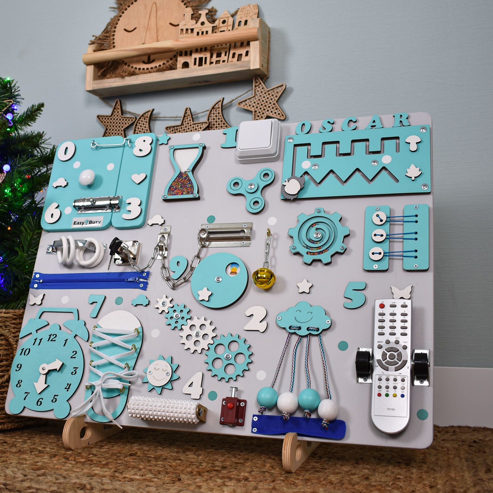 Compact busy board stand with sturdy legs and secure grooves