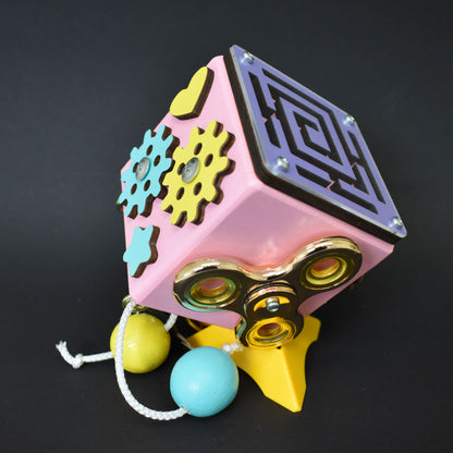 Interactive fidget toy cube with spinner and bell