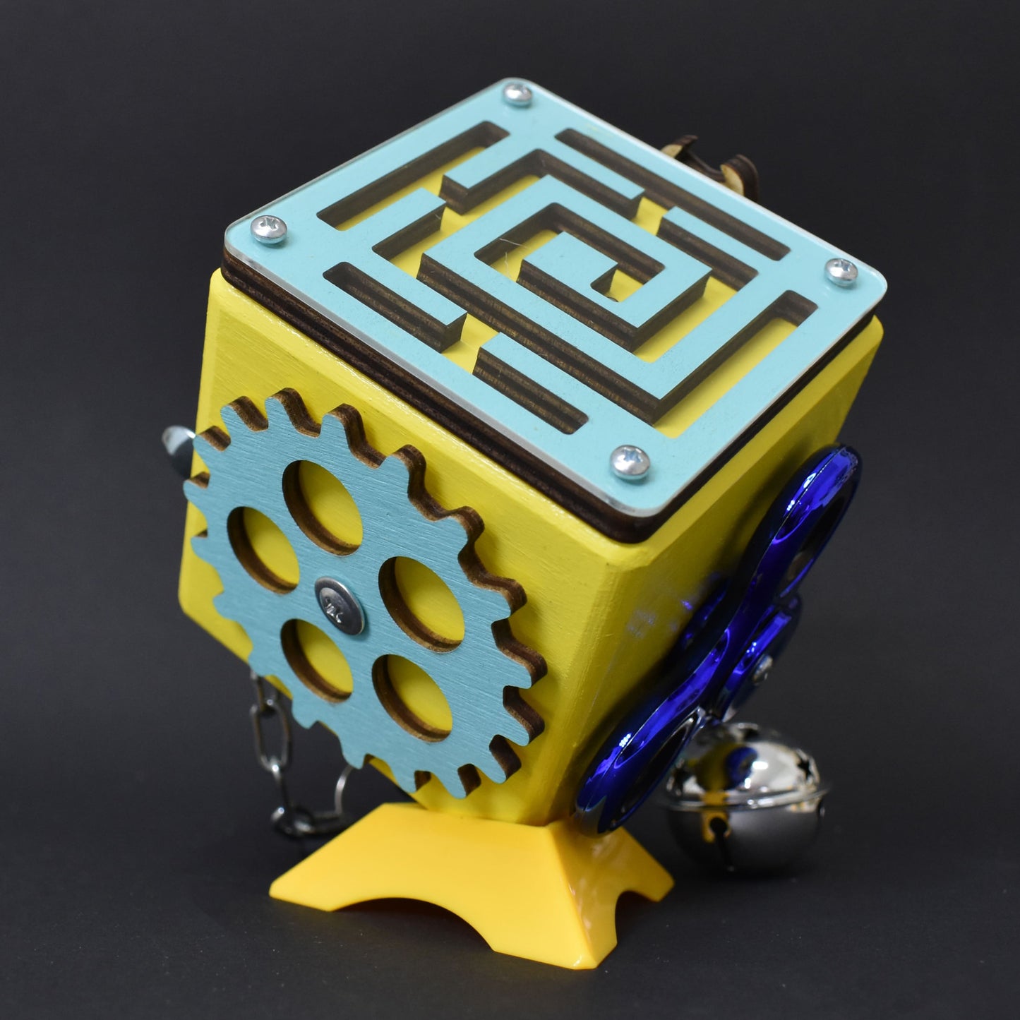 Robot-themed busy cube with gears and caster