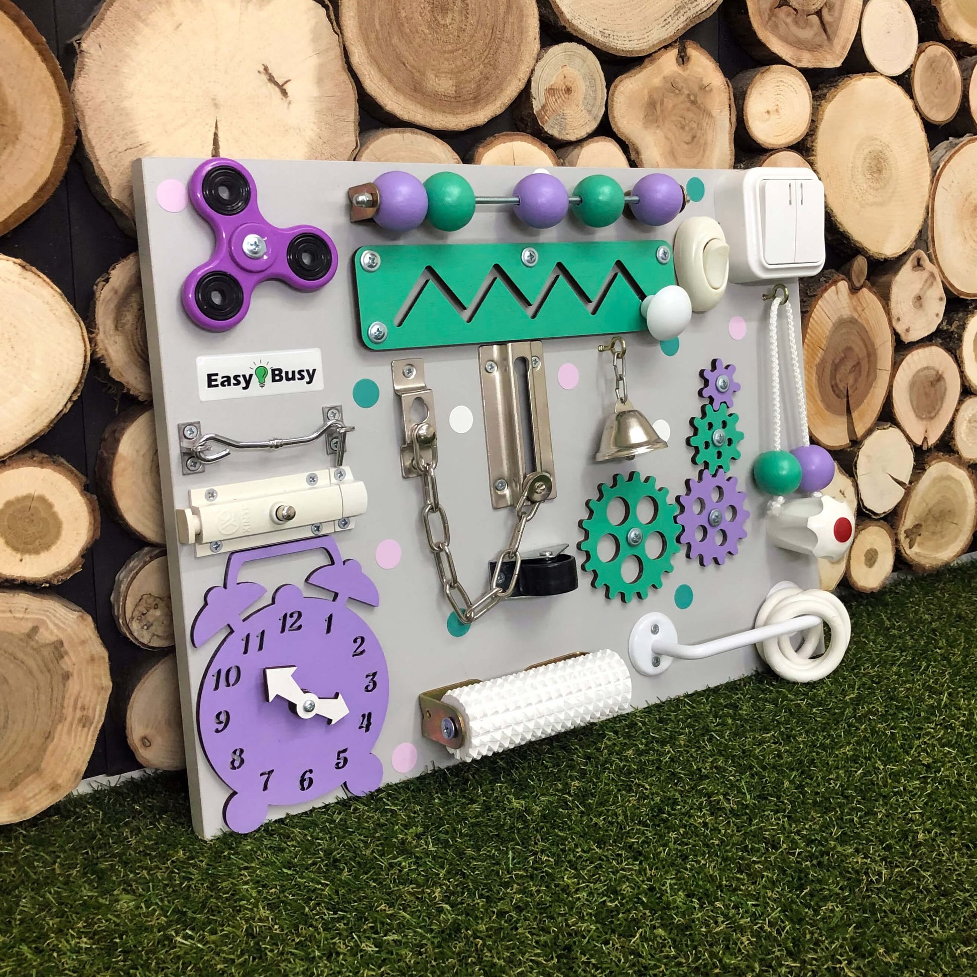 Colorful sensory activity board with beads, spinner, and bell for early learning play