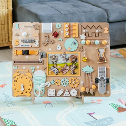 Interactive barnyard animals on a handcrafted busy board