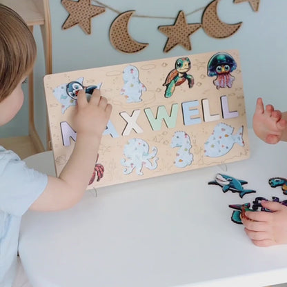 Toddler toy with fish, seahorse, and turtle magnets
